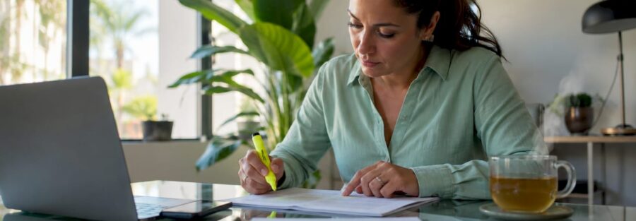 Woman reviewing trucking insurance documents