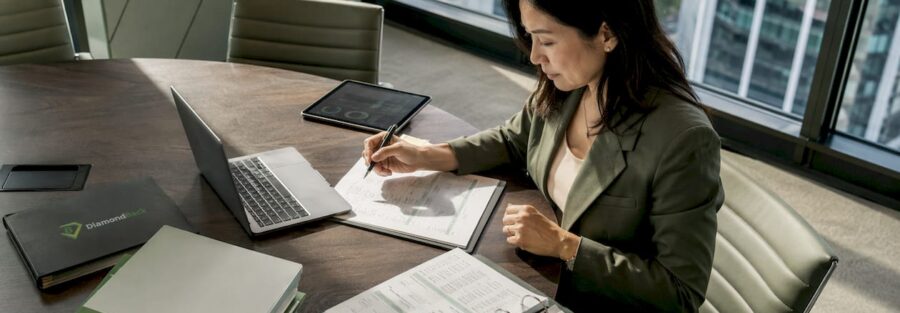 Business owner reviewing insurance audit documents